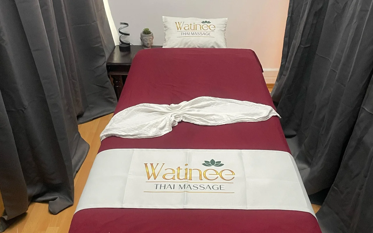 Massage bed prepared for a Thai massage treatment